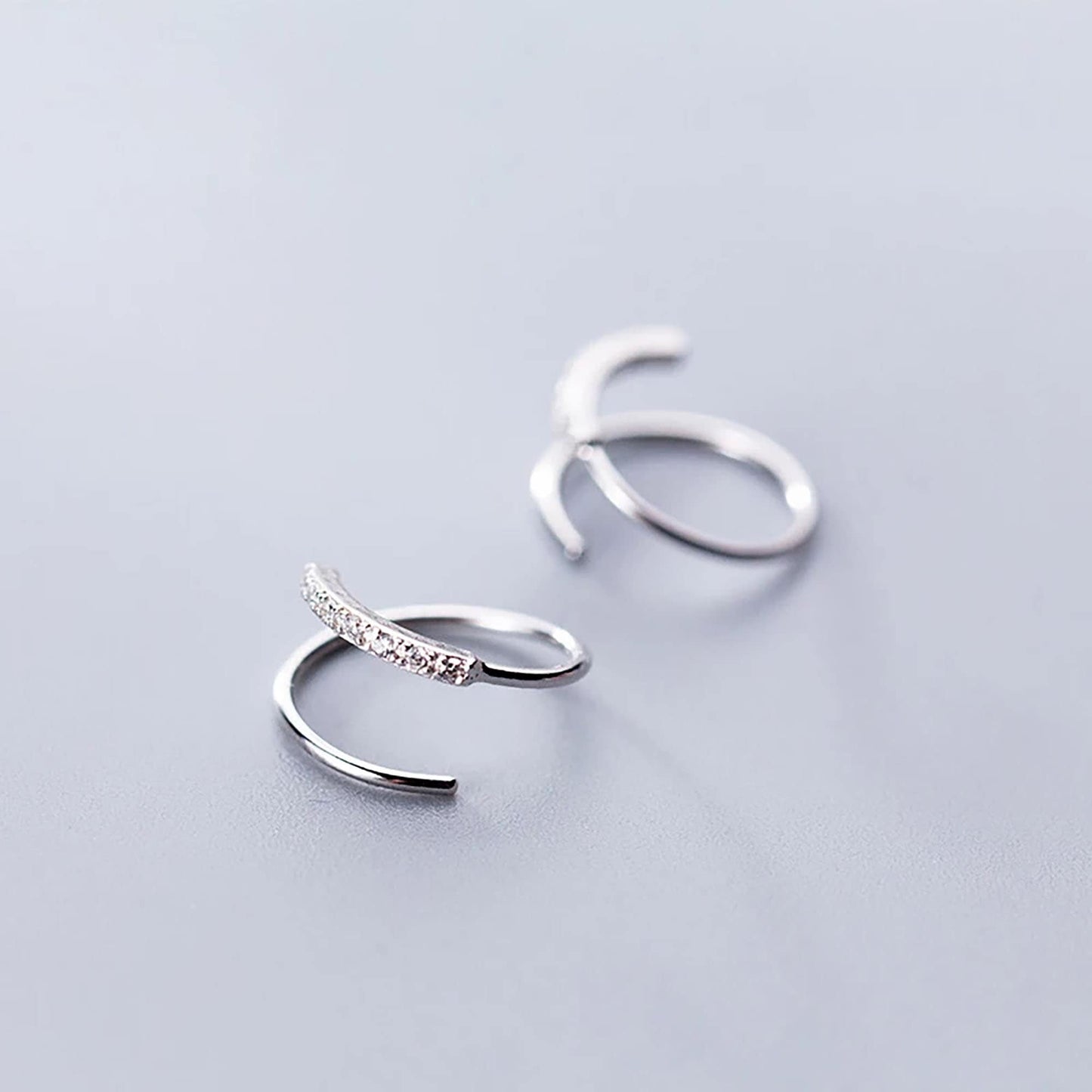 CZ spiral hoop earrings for single/double piercing, silver/rose-gold vermeil  StudioVy   