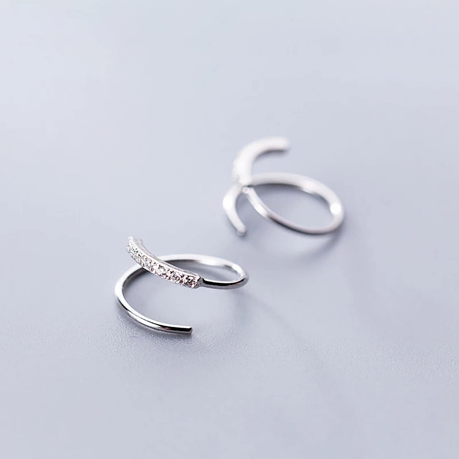 CZ spiral hoop earrings for single/double piercing, silver/rose-gold vermeil  StudioVy   